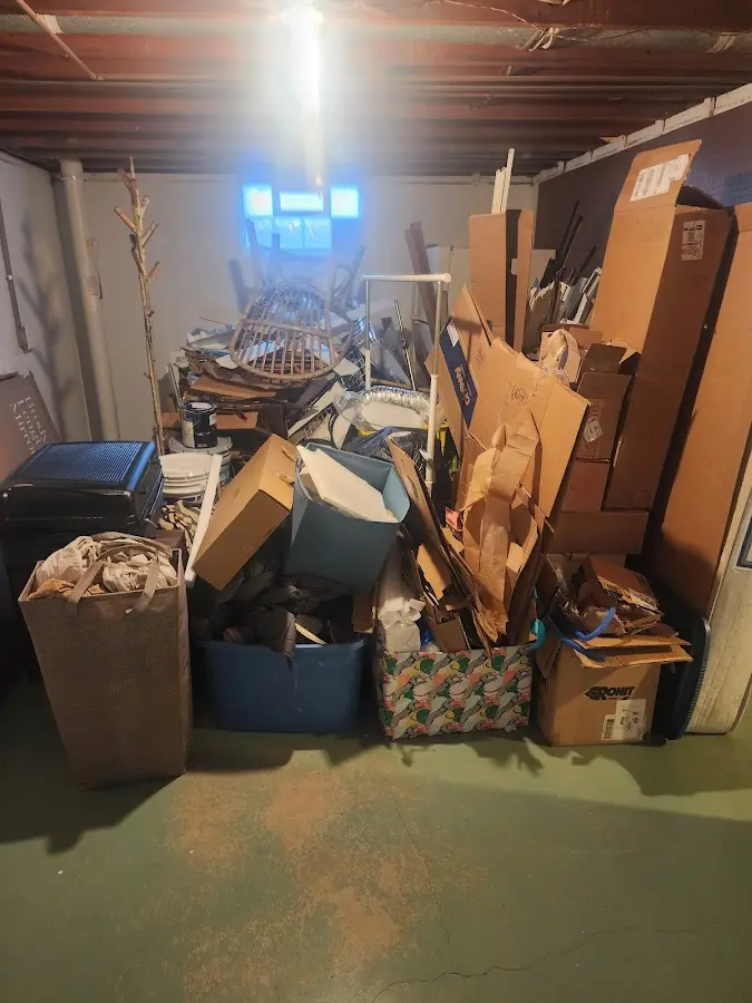 Roll-off dumpster container at job site for 6 Yard Dumpster Rental in Bayport